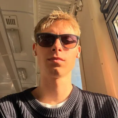 J S